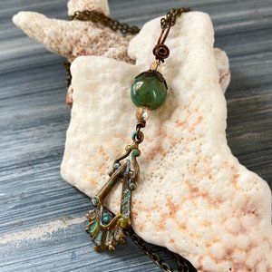 Handmade necklace green patina mixed metals glass bead champagne pink crystals